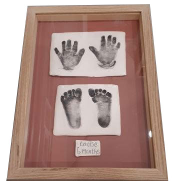 Baby hands and feet prints by Brid Lyons